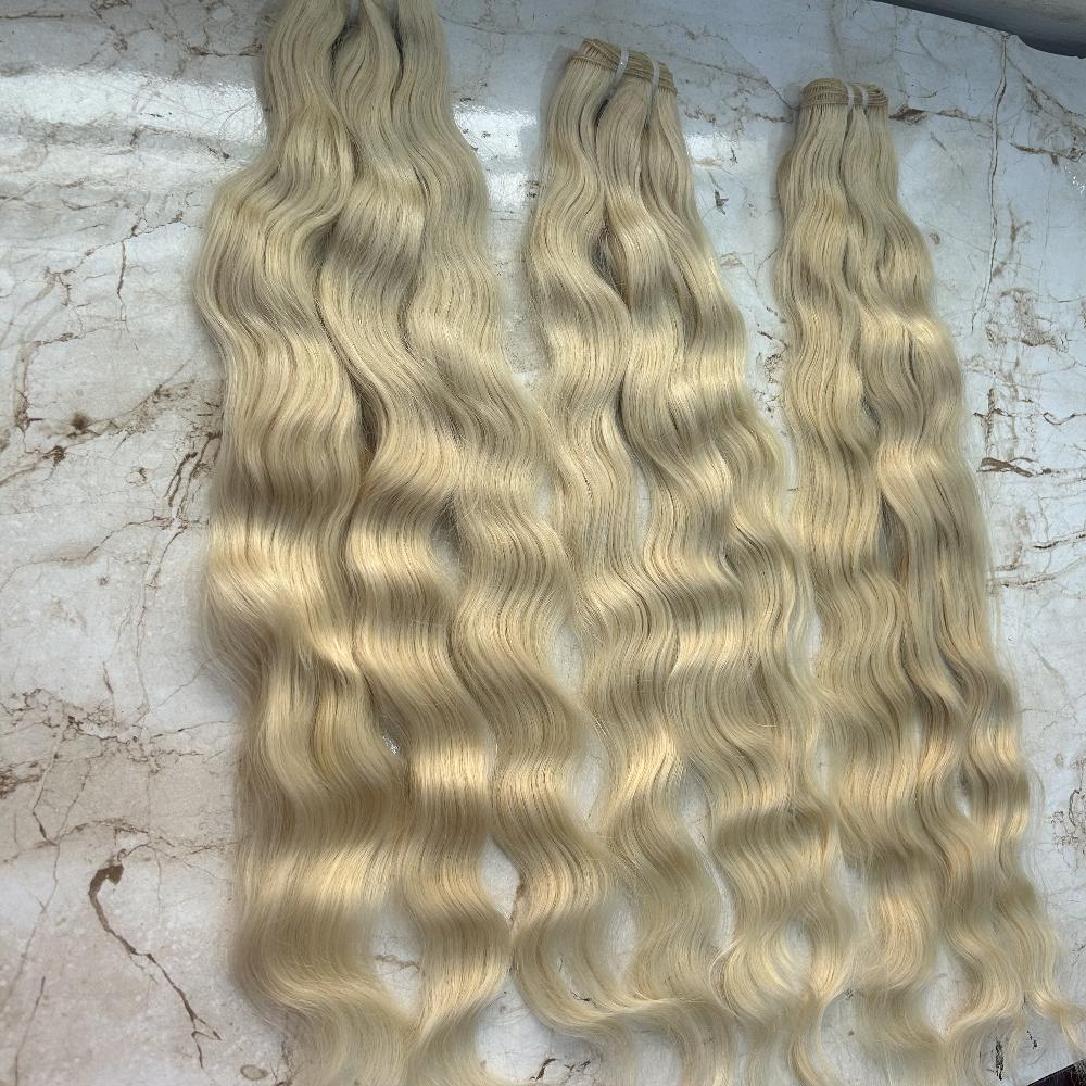 613 Blonde Wavy Human Hair Bundles